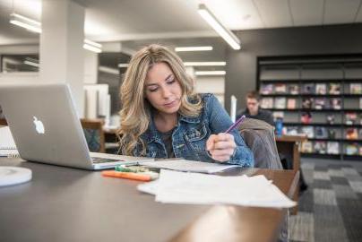 Student studying in the library.